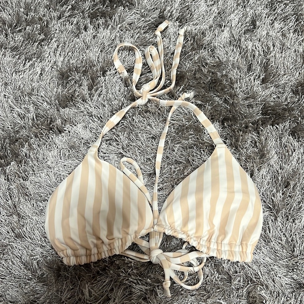 Stripped white and nude stripped hollister bikini top string. Size medium.